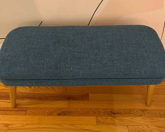 R44 - $40. Blue Bench. Measures 38" x 15.5" x 15.5" tall. Wooden Legs and upholstered top. Sturdy and in very good condition!