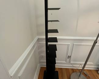 R33 - $40. Black Spine Bookcase. Metal. In very good condition.