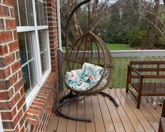 R60 - $100. Hanging Egg Chair with stand. (Cushion is usually stored and accidentally got left out last night!) Stand has a small amount of surface rust but it's still very sturdy.