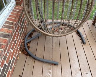 R60 - $100. Hanging Egg Chair with stand. (Cushion is usually stored and accidentally got left out last night!) Stand has a small amount of surface rust but it's still very sturdy.