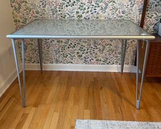 R50 - $95. IKEA Vika Lauri Frosted glass desk with hairpin legs. Legs can be removed for transport if needed. Measures 46" x 30.5" x 29" tall.
