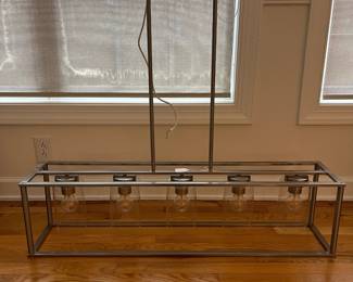 R15 - $50. Pendant Light. Measures 41" wide x 8.5" deep x 35" tall. Brushed Nickel. Works just switched out for a different style.