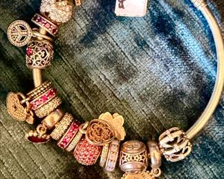 Pandora sterling charm bracelet.