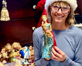 Ann with lots of Barbies.