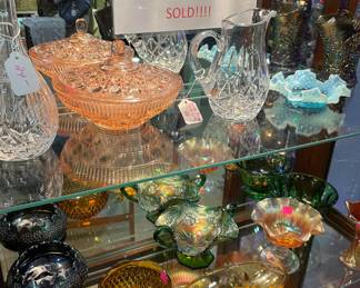 Curio Cabinet Filled with Fenton Carnival Glass Assorted Styles and Colors, Crystal Pitchers