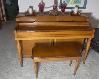 acoustic Wurlitzer console piano with bench