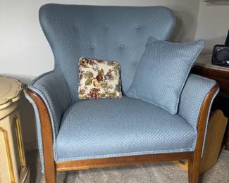 vintage wood-frame wingback chair