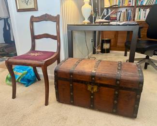 Mid-19th-century Jenny Lind style trunk on wheels and vintage Duncan Phyfe-style mahogany side chair with carved back and needlepoint seat