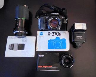 Vintage Minolta 35mm Film Camera Kit –
Vintage Minolta 35mm Camera Kit – Includes Minolta Rokkor-X 50mm f/1.7 prime lens, Vivitar 70–210mm macro zoom, and Vivitar 28mm wide-angle.