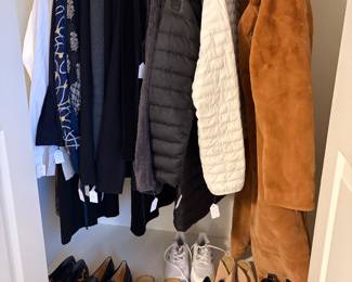 more clothing for sale along with shoes of various sizes