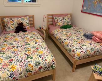 $90 pair of twin beds and mattresses. Frame measures 41”w x 36”h. (Bedding sold separately during in person sale) Beds available for online and in person purchase.  They can be separated if two people ask about buying only one.