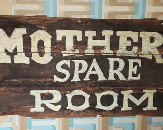 large sign on old boards