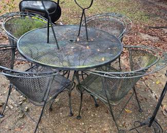 One of three wrought iron patio sets
