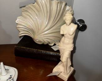 MCM shell table lamp and Venus de Milo statue.
