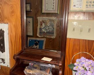 Antique wall hanging shaving mirror