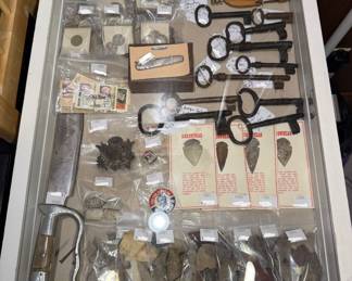 Guy stuff!
Arrow heads, knives, coins, jailhouse keys
