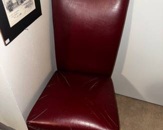 Red vinyl parsons chair. Two available