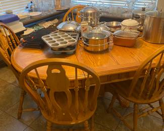 Kitchen table and kitchen pans