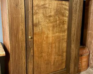 $450 - Wood wardrobe on casters. Shelves & rod inside.