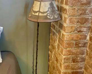 $150 - Antique or vintage wrought iron floor lamp with a fabric shade. 