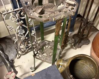 Vintage decorative cast iron plant stands. 