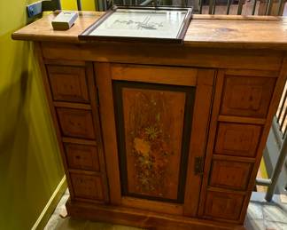 $400 - Narrow apothecary cabinet with painted door from "Home Alone" set.