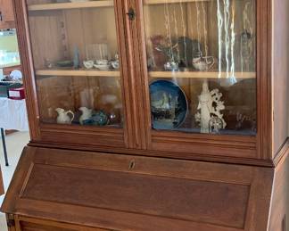 Wonderful Eastlake walnut secretary with glass display top in two pcs. Need new felt…wood is excellent!