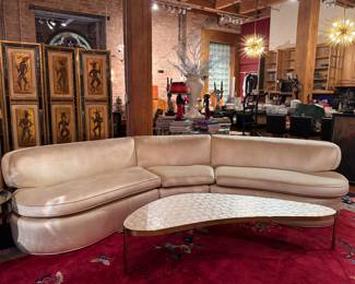 Sculptural Mid-Century Modern Cocktail Table with Freeform Biomorphic Top and Slender Metal Legs. Likely Italian or French Manufacture, circa 1950s–1960s. Measures 68" W x 26" D x 16" H. Photo 1 of 7. 