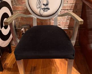 Lacquered Wood Frame Arm Chair. Round Back Upholstered in Piero Fornasetti Fabric Teme e Variation N. 81: Smoking Face of Opera Singer Lina Cavalieri. Measures 22" W with 19" Seat Height. Photo 1 of 2. 