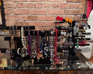 Costume Jewelry including Earrings, Bracelets and Necklaces. 