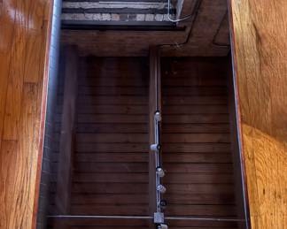 Mid-Century Waterfall Coffee Table with Ebony Mirrored Glass Top. Measures 37" W x 21" D x 16" H. Photo 3 of 3. 