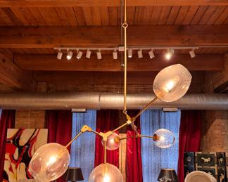 Lindsey Adelman 5-Globe Branching Bubble Chandelier With Clear Glass & Brass Frame. Fixture Measures: 64" W x 21" D x 21" H. Overall Height: Min: 24" - Max: 93.25". Photo 1 of 3. 