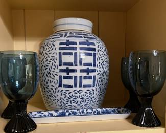 blue stemware and glazed pottery