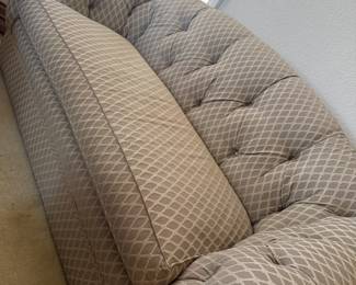 Gorgeous tufted taupe and white sofa