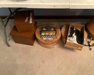 Left to right - set of brown painted boxes, round cheese boxes & vintage cheese box - shoes in box will be in bedroom