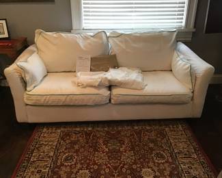 2 cushion sofa with brand new slip cover
