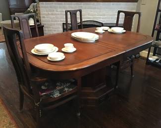 Far Eastern Furnishings Co. Okinawa dining room table with 2 leaves, pedestal base and 4 of the 8 chairs
