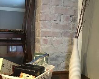 assorted candles and white vase