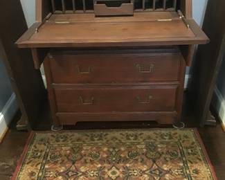 drop front desk with area rug