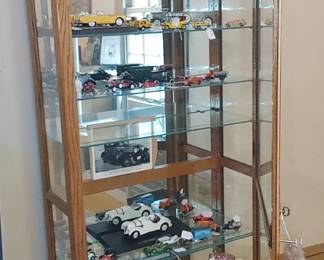 Philip Reinisch Company solid oak Illuminated Curio Cabinet