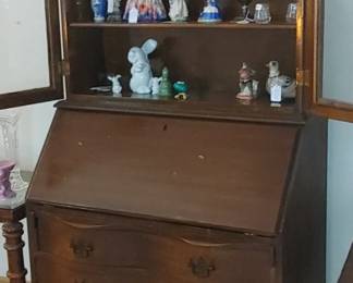 Beautiful antique bow front secretary ball and claw feet belong to my great-grandmother