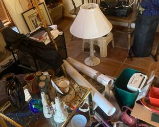 Lamp, bench, small decorative objects, glass table