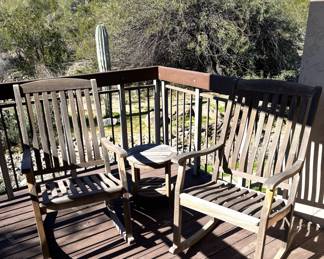 2 outdoor wooden rocking chairs