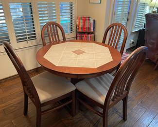 Round Tiled Dining Table with 4 Cushioned Chairs