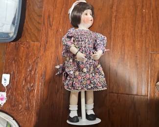 A 1991 Ashton Drake 'Rosemary' porcelain collectible doll by Patricia Coffer.