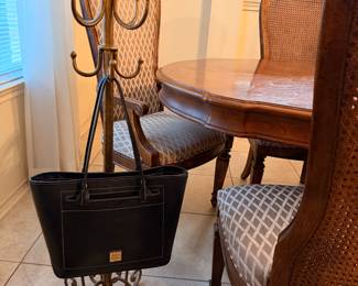 Purse is just modeling — the stand is what’s for sale.