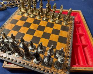 Leather board and heavy pewter players with stow away carrying case.... divine!