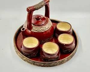 Vintage Ceramic Teapot Set with Four Cups and Serving Tray Red Glazed Embossed Accents