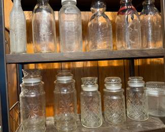 Planter’s peanut jars and various vintage bottles