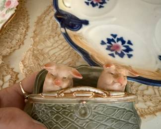 Cute old Pigs in a purse